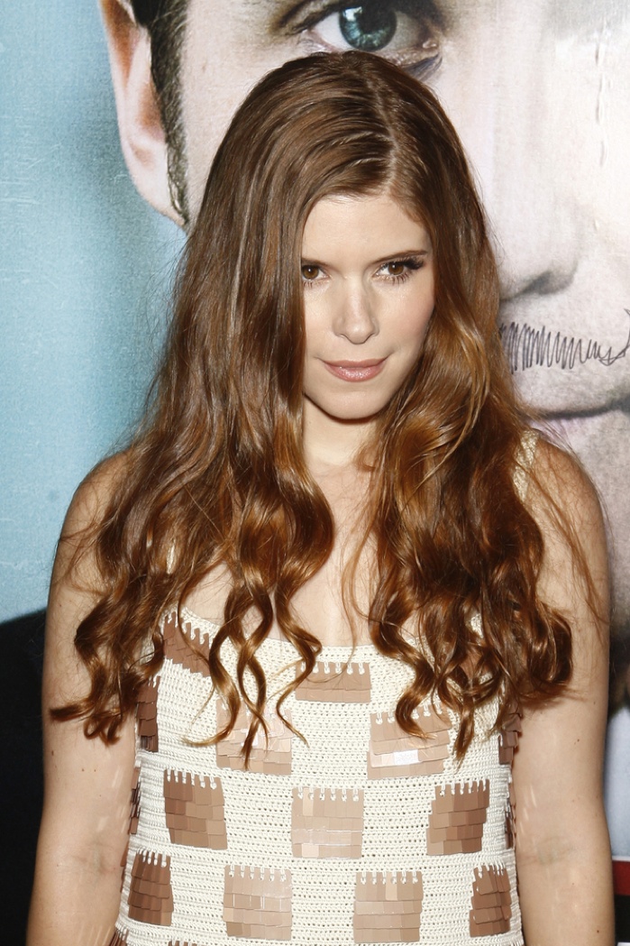 Kate Mara sports a long and wavy hairstyle as a redhead. Photo: Helga Esteb / Shutterstock.com