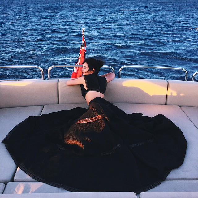 Kendall living the glam life on a boat complete with a crop top and matching skirt. Photo: Instagram