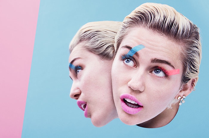 Miley Cyrus poses in Paper Magazine's summer 2015 issue