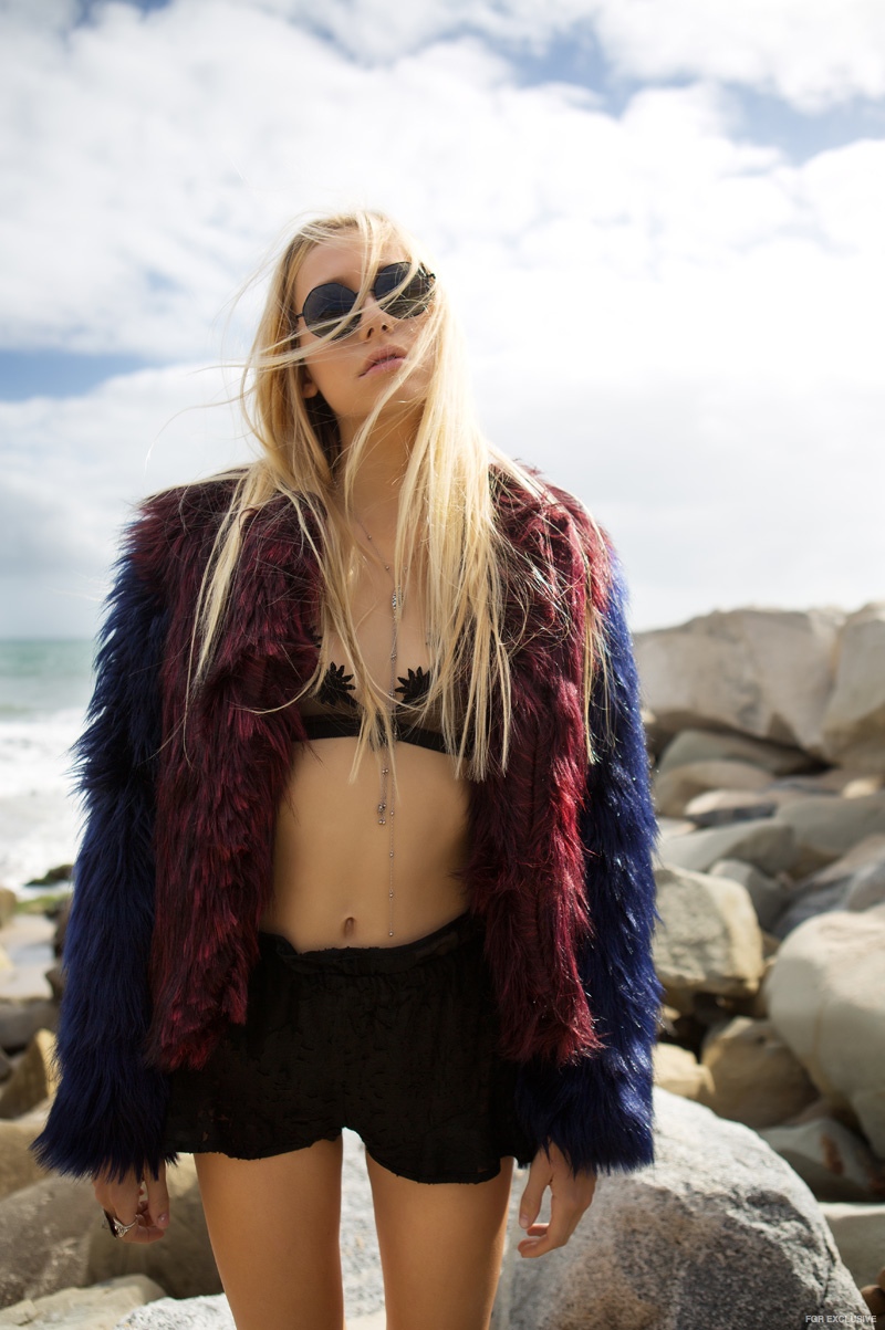 Shannon wears Bralette For Love and Lemons, Shorts For Love & Lemons, Jewelry Vanessa Mooney