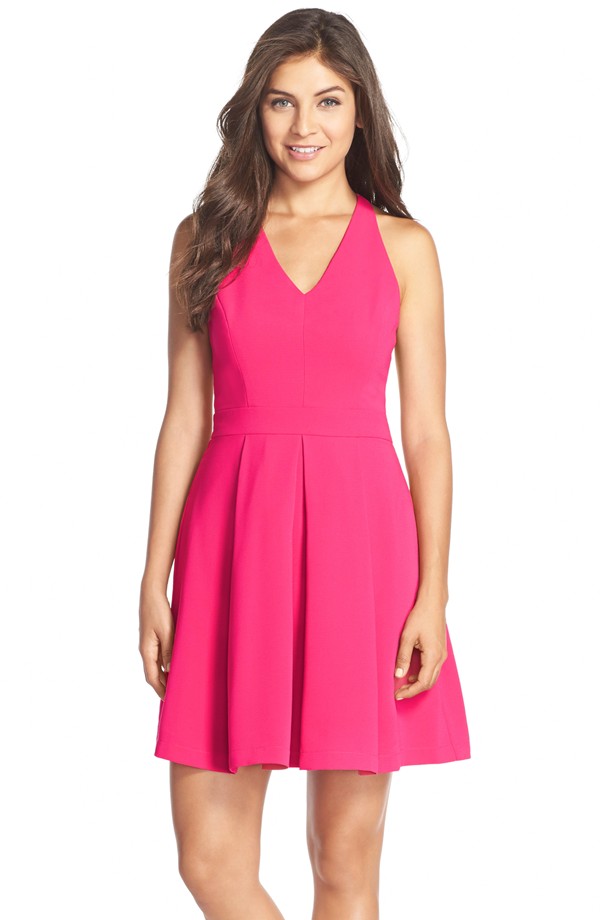 One of Kimmy's favorite colors are hot pink. Channel her vibrant style with Adelyn Rae's Stretch Fit & Flare Dress available at Nordstrom. 