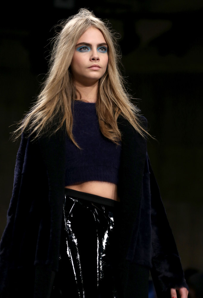 Cara Delevingne on the Topshop runway. Photo: Featureflash / Shutterstock.com