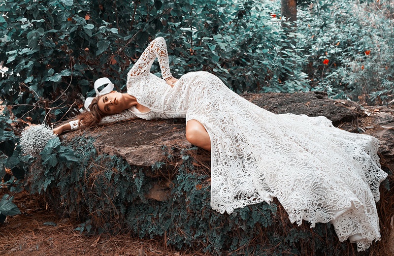 Britt wears white bridal lace in this image