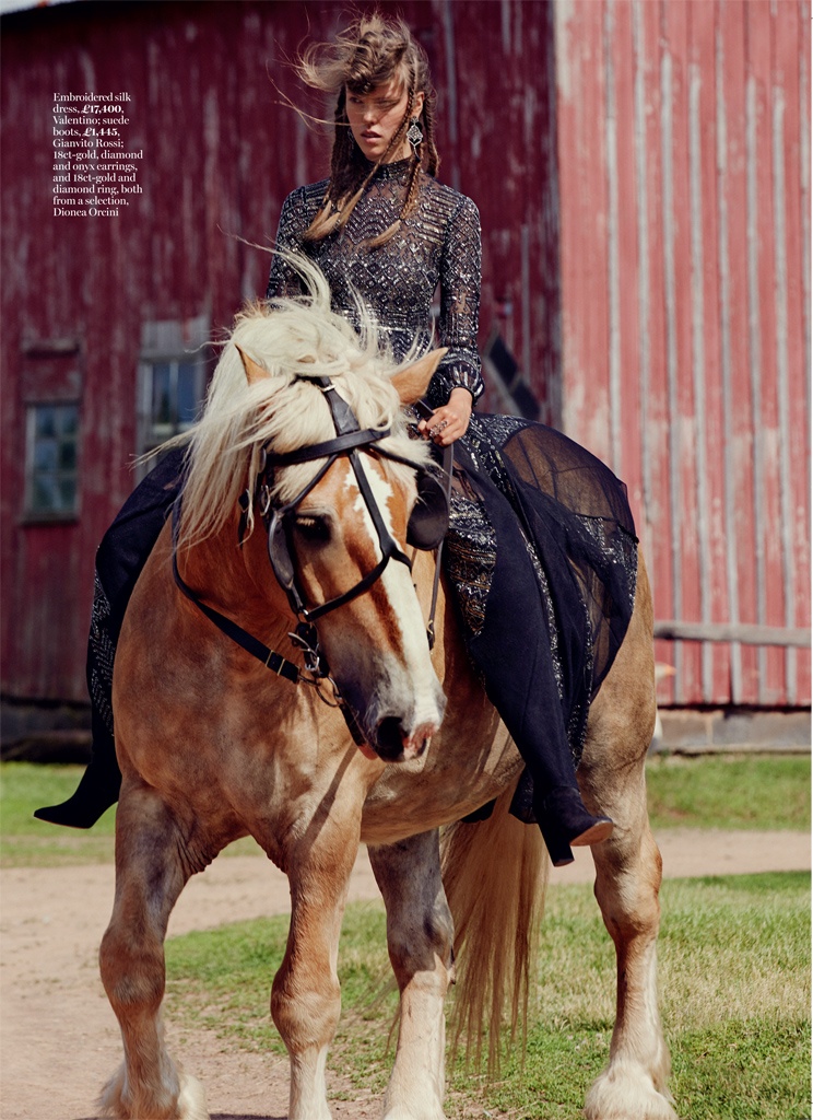 The model poses on a pony