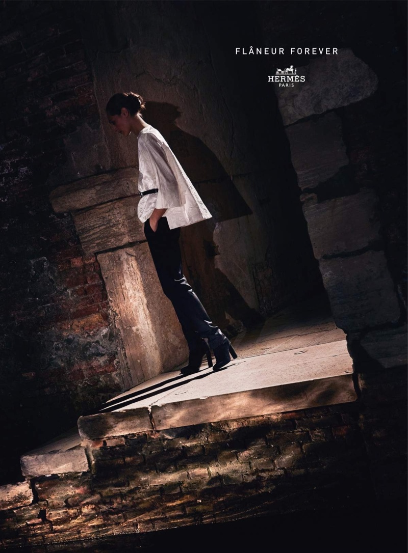 A model strolls in Hermes' fall 2015 advertisement