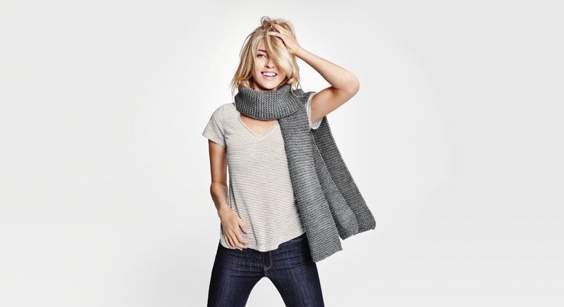 The model wears an oversized scarf with a casual tee and denim