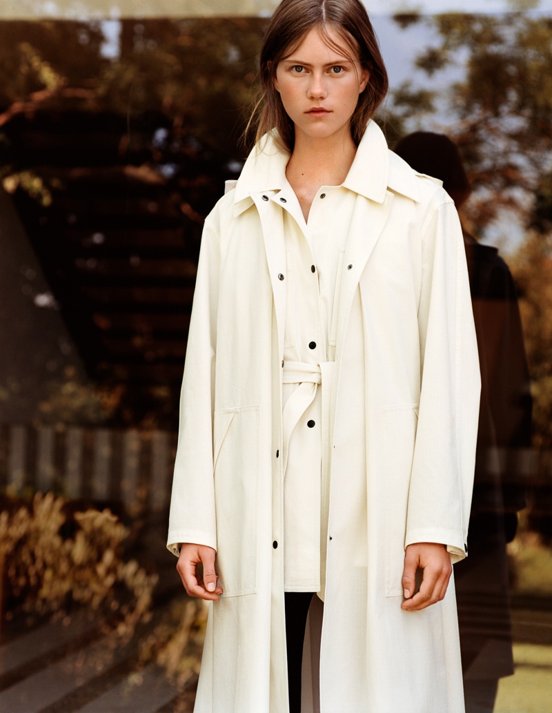 Model wears hooded coat from UNIQLO and LEMAIRE collection