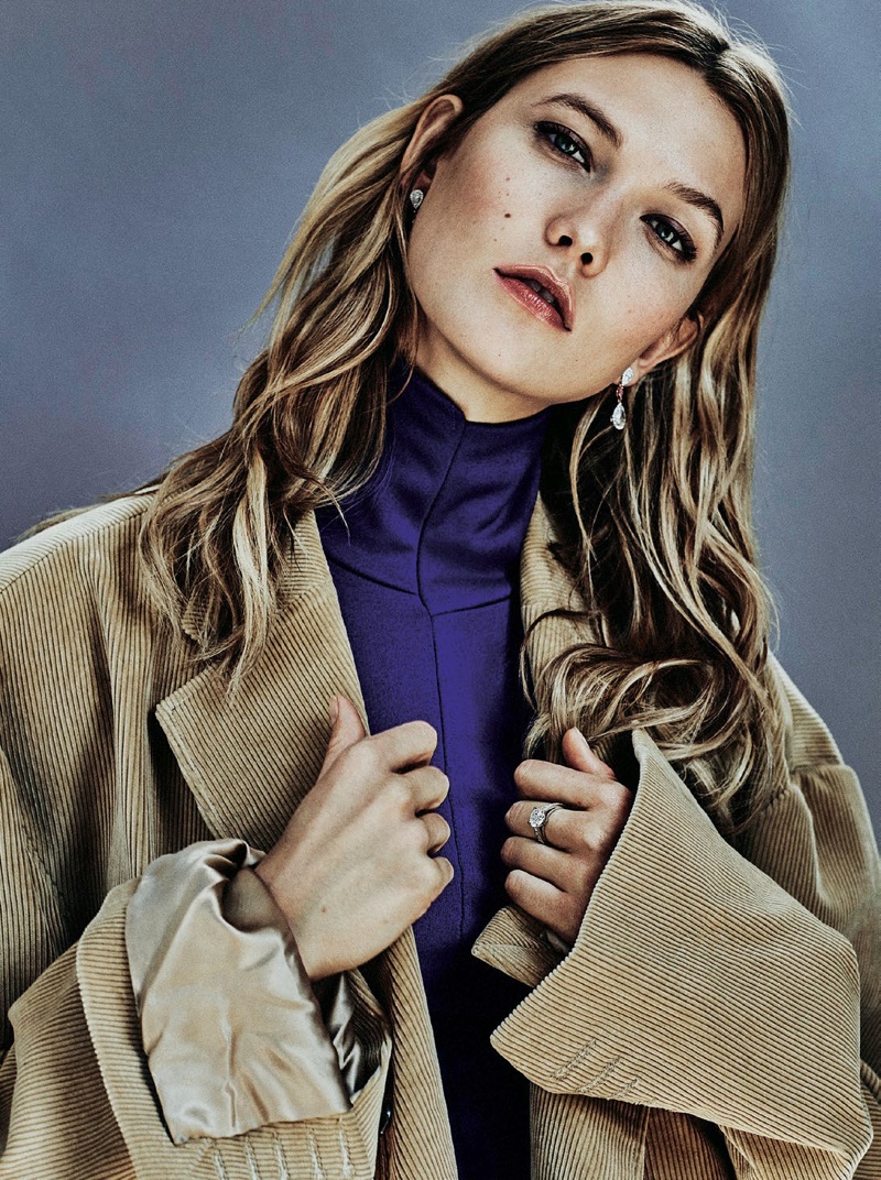 Karlie layers up in an oversized coat