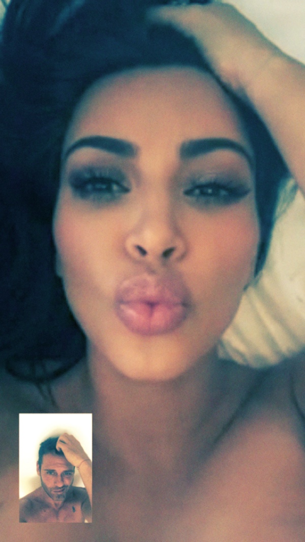 Kim Kardashian puckers up her lips to the camera for Interview