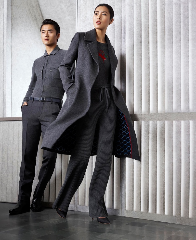 Liu Wen wears a menswear inspired coat and pants look