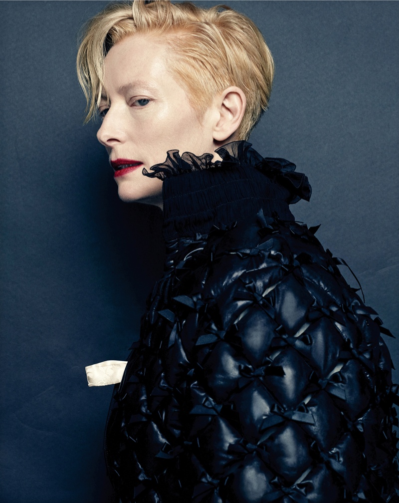 Tilda wears quilted jacket with high collar from Chanel