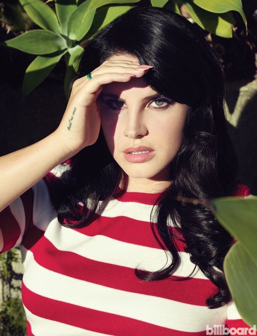 Lana wears a striped t-shirt in red and white