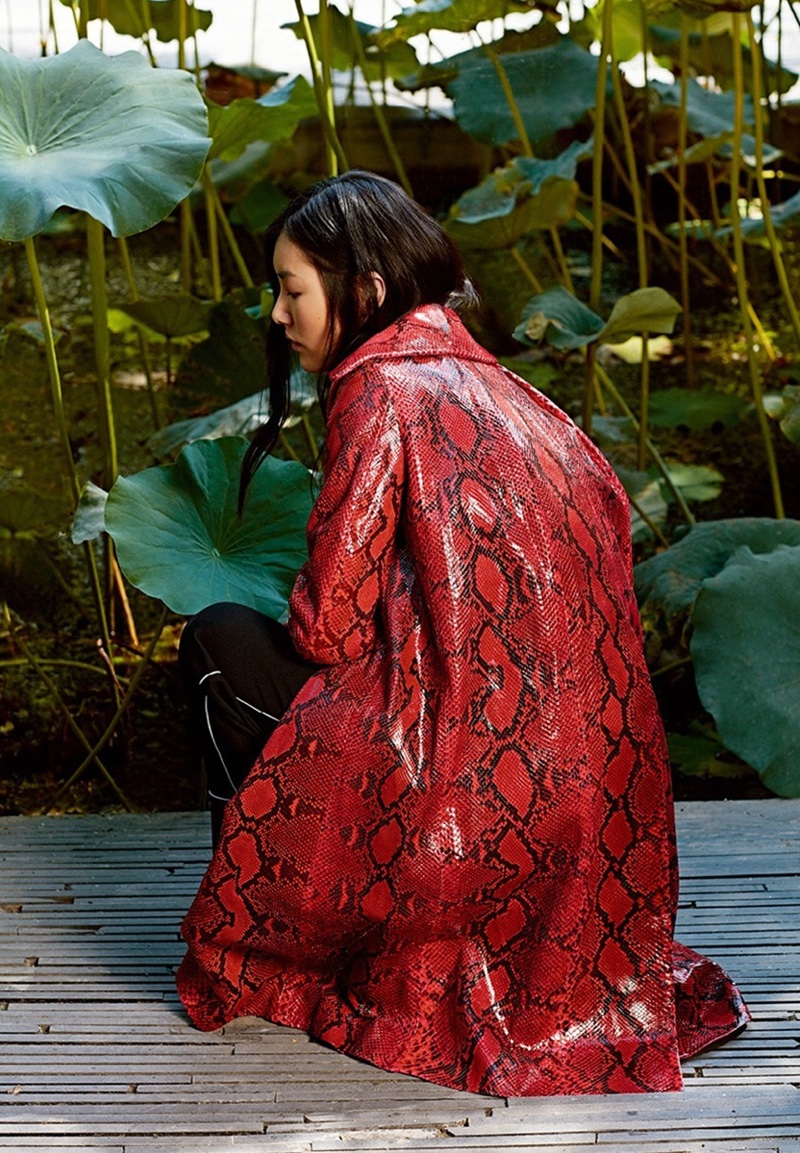 Liu Wen models red python print coat from Miu Miu