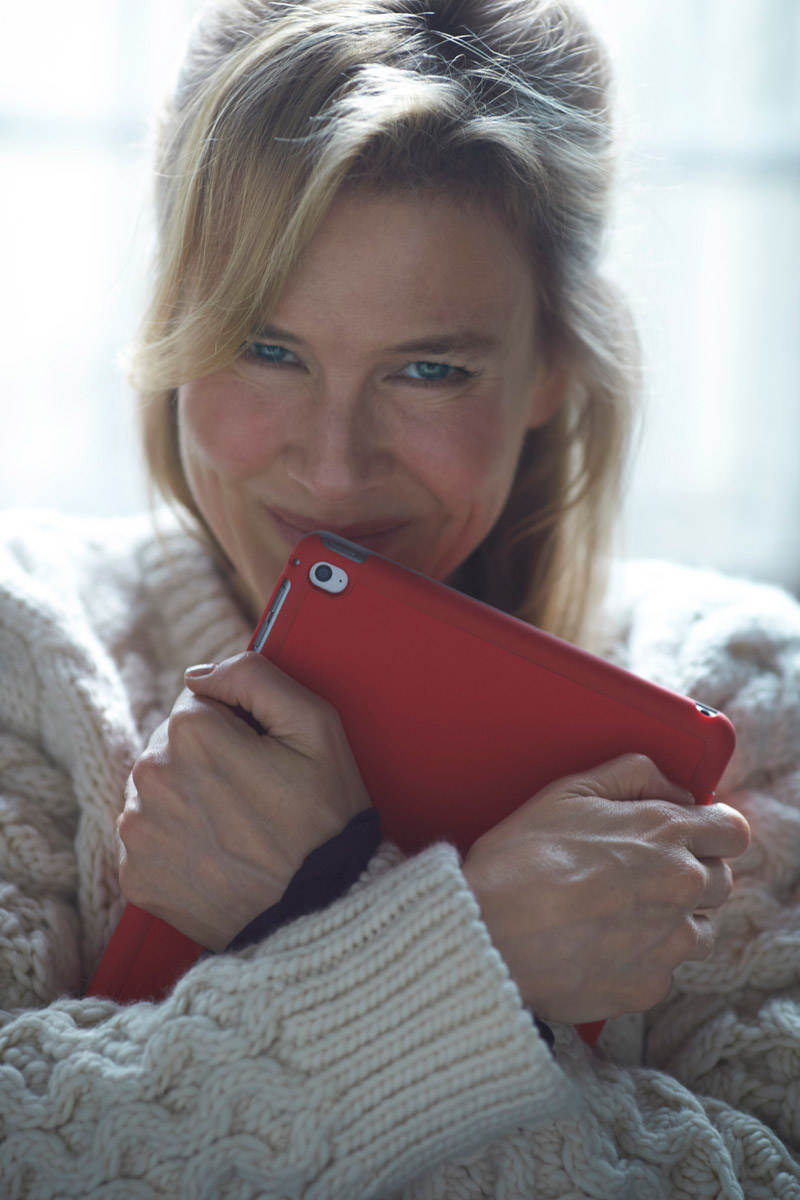 Renee Zellweger is back for 'Bridget Jones’s Baby' which is the third installment in the Bridget Jones series. Working Title has released an image of Renee in character while clutching to an iPad. Photo: Working Title Films