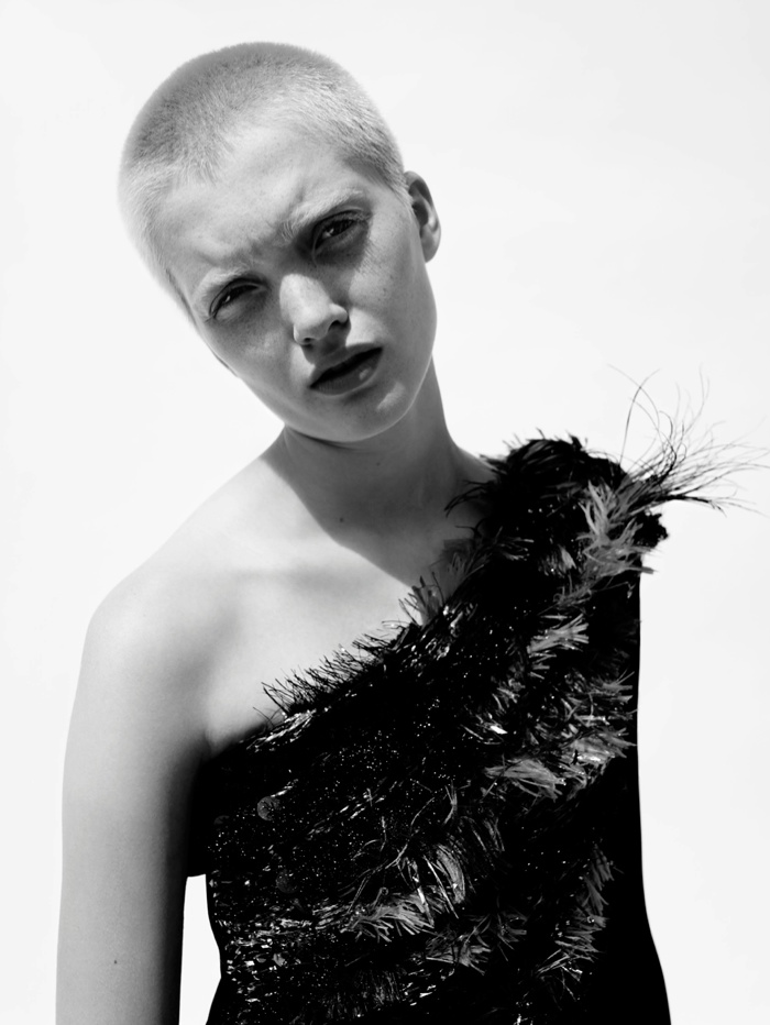The model poses for Hedi Slimane in fall haute couture designs