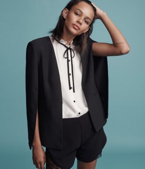 Binx Walton Wears Tailored Jumpsuits for Urban Outfitters' Holiday Catalog