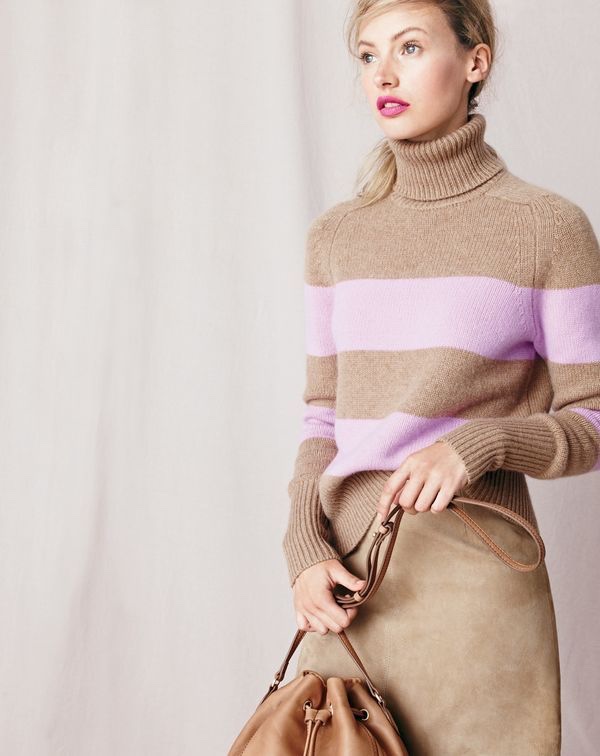 J.Crew women’s Collection Italian cashmere ribbed turtleneck in stripe, Collection A-line midi skirt in suede and bucket bag.