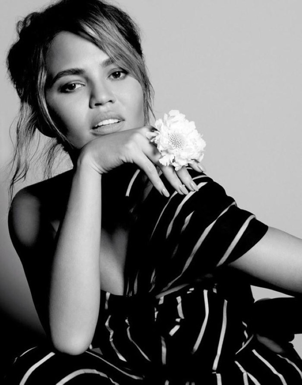 Chrissy poses in black and white image