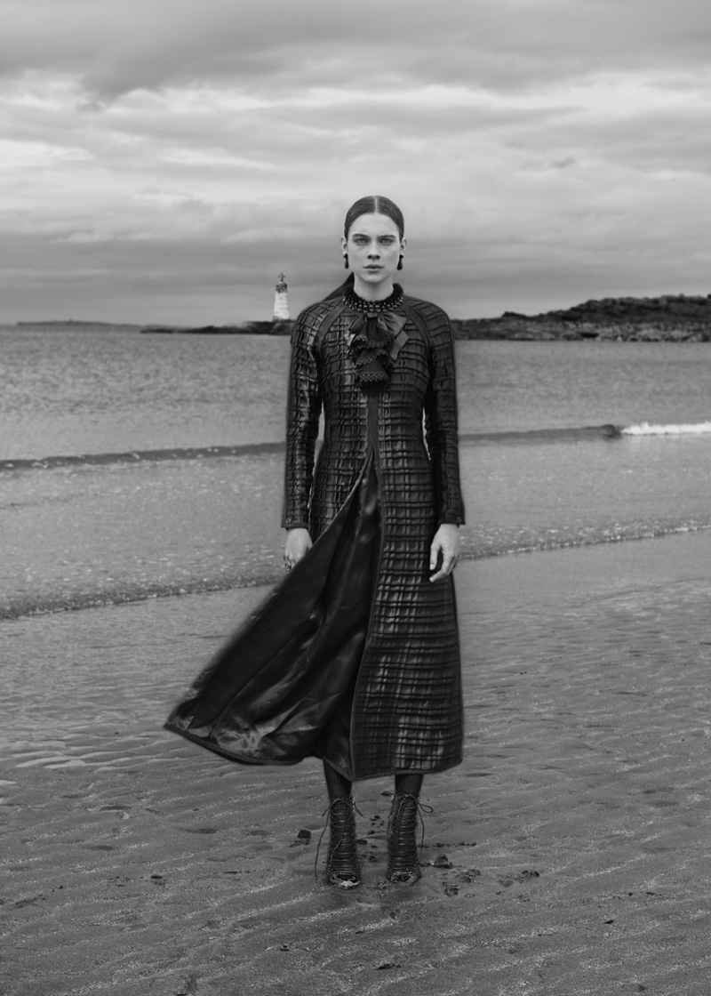 The model poses in gothic inspired fashion looks for the editorial