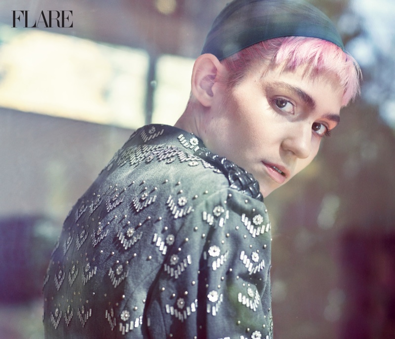 The singer wears a pink hairstyle in the photo spread