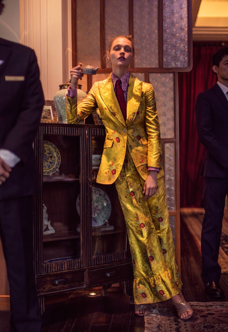 SUIT UP: Sasha models a yellow brocade Gucci pantsuit