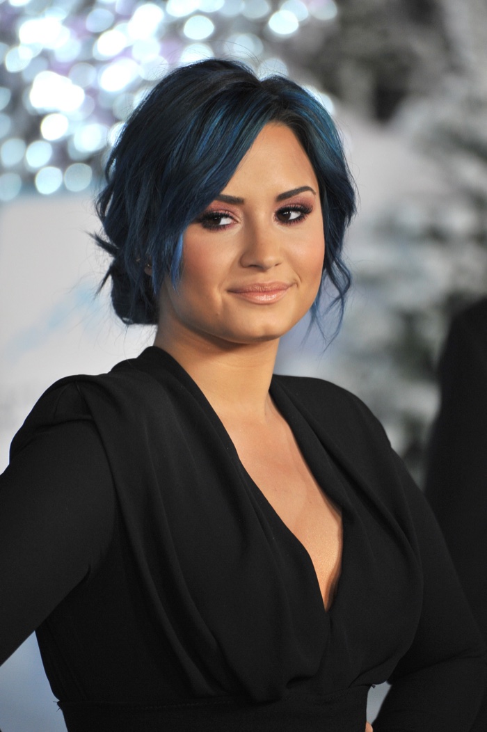 Attending the premiere of Frozen in 2013, Demi Lovato showed off a cool blue hair color. Photo: Jaguar PS / Shutterstock.com