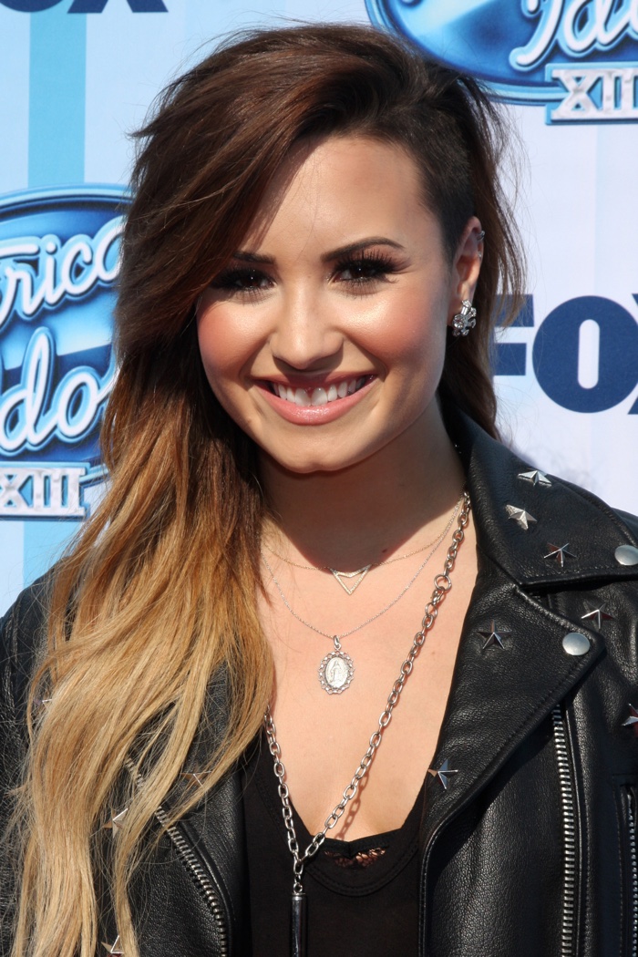 Here is another look at Demi's shaved hairstyle in 2014. Lovato paired the look with long blonde waves. Photo: Helga Esteb / Shutterstock.com