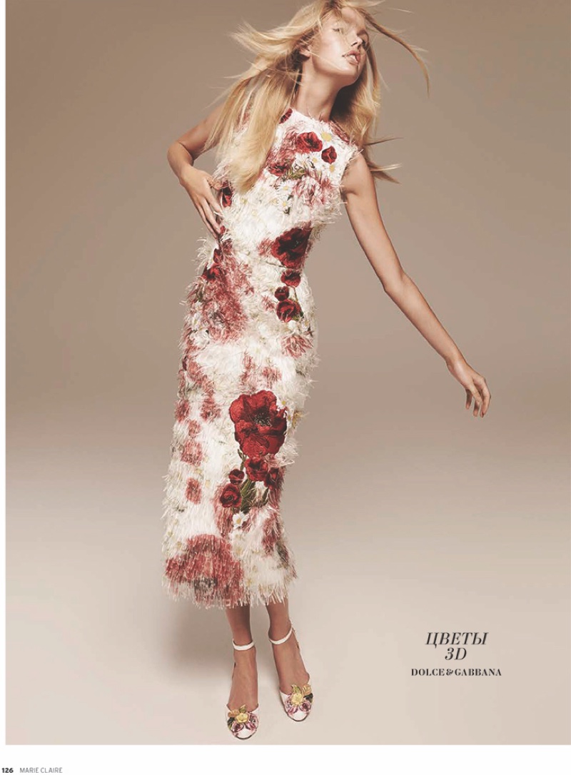 FLOWER POWER: Emma wears floral print dress by Dolce & Gabbana