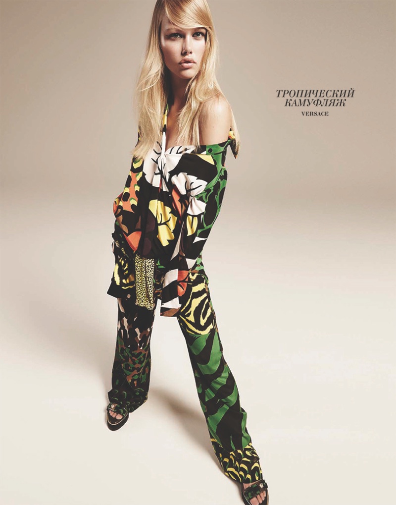 JUNGLE JUMBLE: Emma poses in printed top and trousers from Versace