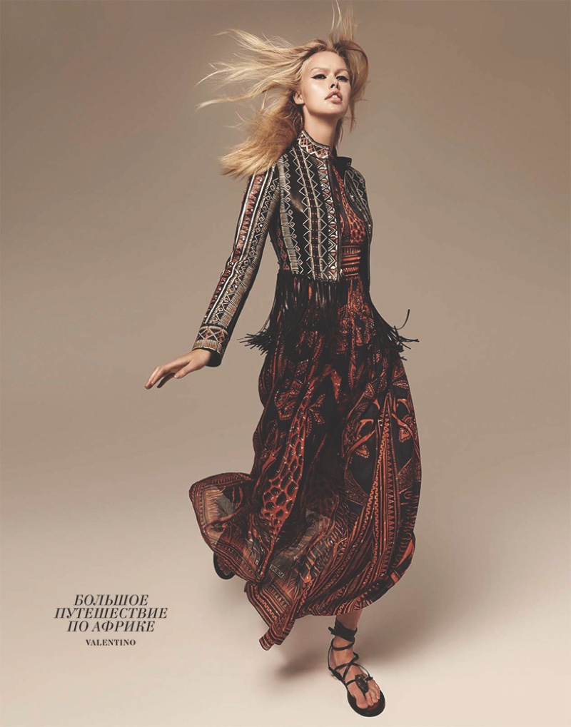 BOHEMIAN GLAM: Emma models Valentino jacket and maxi dress