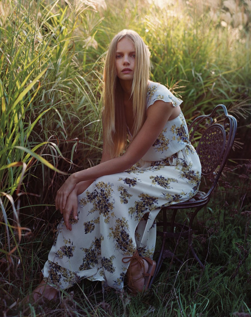 Marloes poses in floral print maxi dress