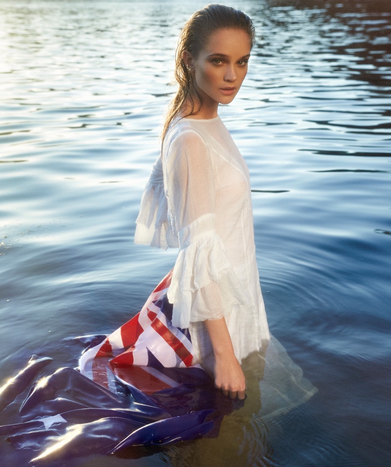 WATER BABY: Rosie Tupper poses with the Australian flag and white Morrison dress