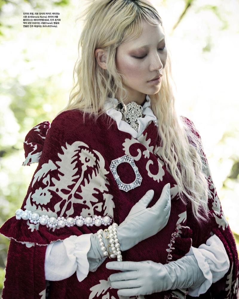 THE NEW EMBROIDERY: Soo Joo models red cape from Simone Rocha