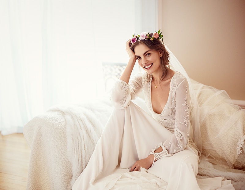 FLOWER POWER: The model poses with floral adorned wedding veil