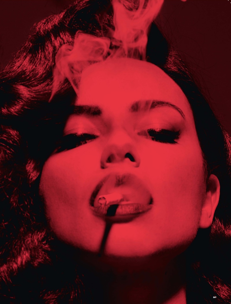 Adriana Lima is smoking hot for this image drenched in red