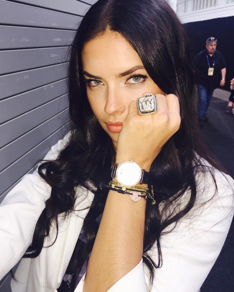 Adriana Lima flashes a giant football ring at the 2016 Super Bowl. Photo: Instagram