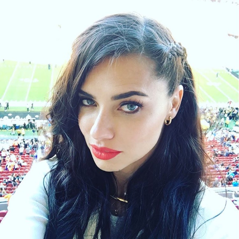 Adriana serves up some major beauty inspiration with a red lipstick shade at the 2016 Super Bowl. Photo: Instagram