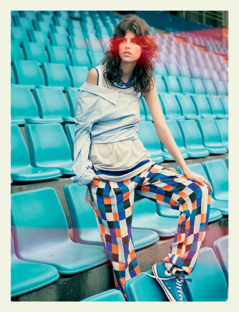 Anthonina Petkovic models asymmetrical top and multi-colored pants by Emilio Pucci