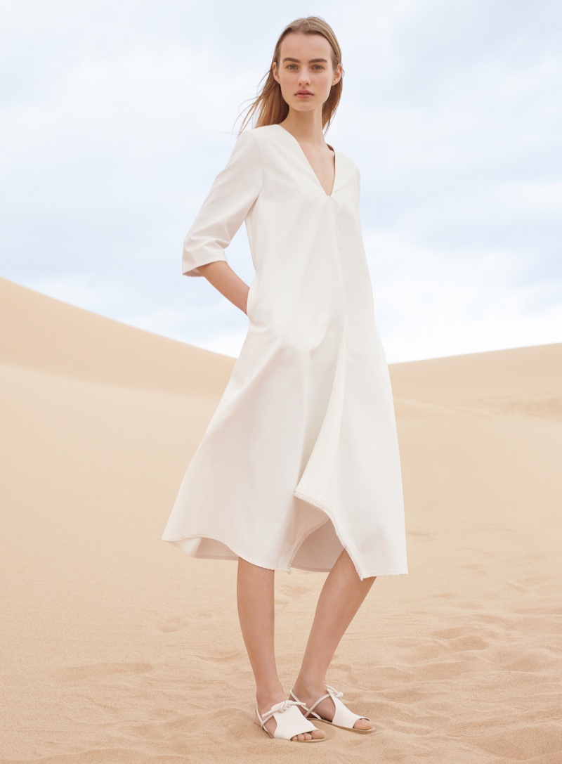 Maartje wears a crisp white tunic dress in COS' spring-summer 2016 campaign