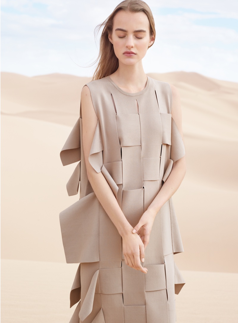 Maartje pictured in a taupe dress with weaving detail for COS' spring-summer 2016 campaign