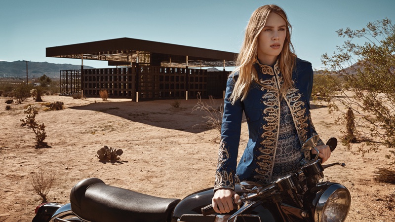 Dylan Penn poses in an embellished band jacket from Fay's spring 2016 collection