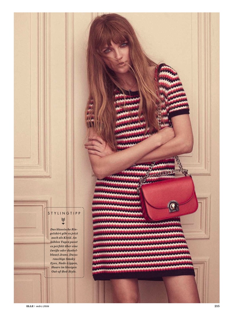 Vlada poses in a striped dress designed by Tommy Hilfiger