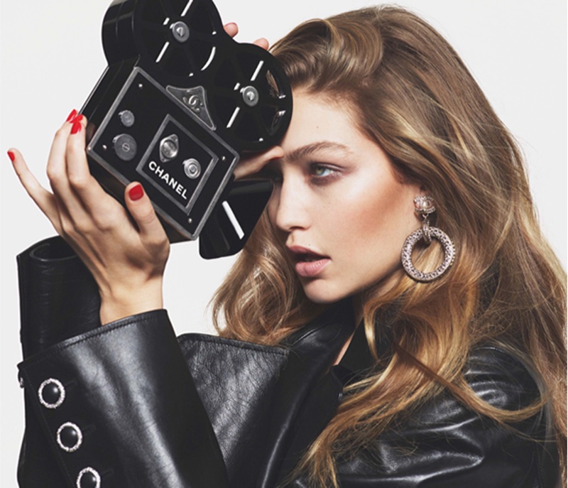 Gigi Hadid poses in leather coat from Chanel