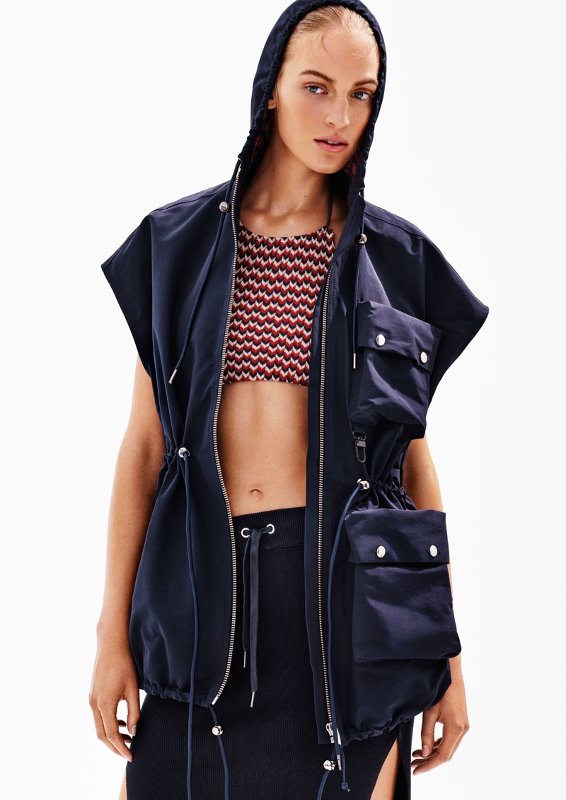 Model wears hooded vest, swimsuit top and skirt from H&M Studio's spring 2016 collection
