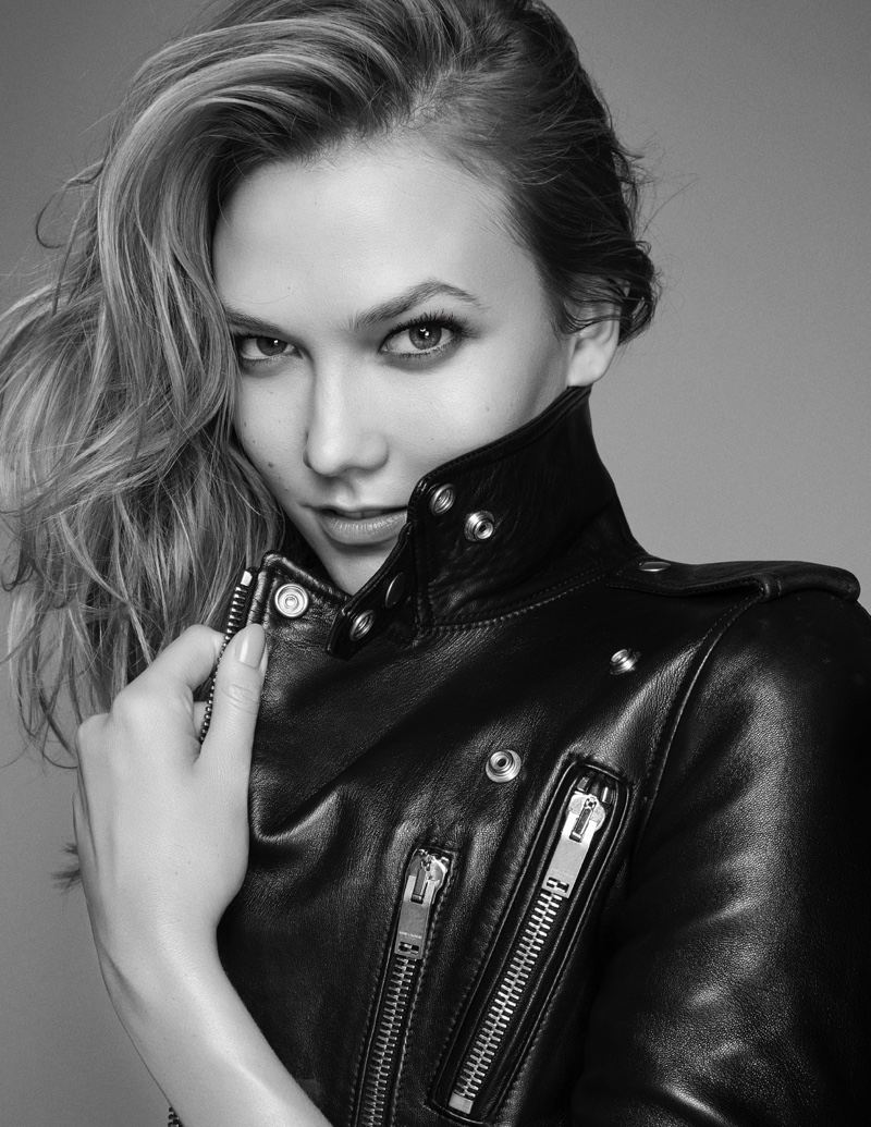 Karlie Kloss rocks a black leather jacket in this image