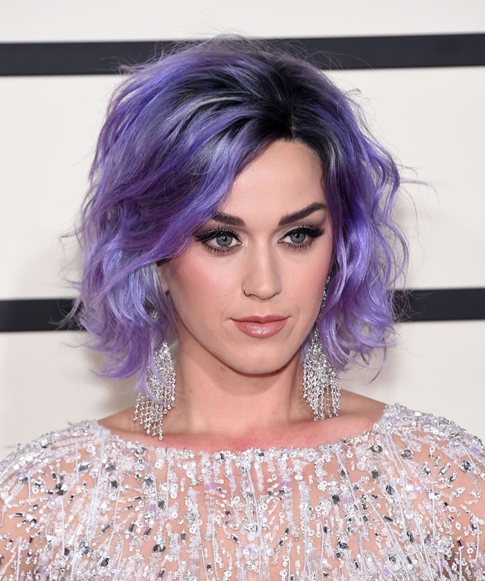 Katy Perry rocks a short and wavy purple hairstyle at the 2015 Grammy Awards. Photo: DFree / Shutterstock.com