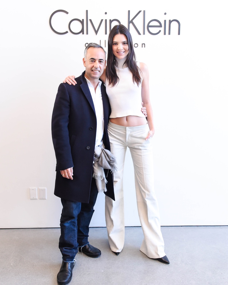 Kendall Jenner poses with Calvin Klein Collection women's creative director Francisco Costa at the brand's fall-winter 2016 show presented at New York Fashion Week. Photo: BFA NYC