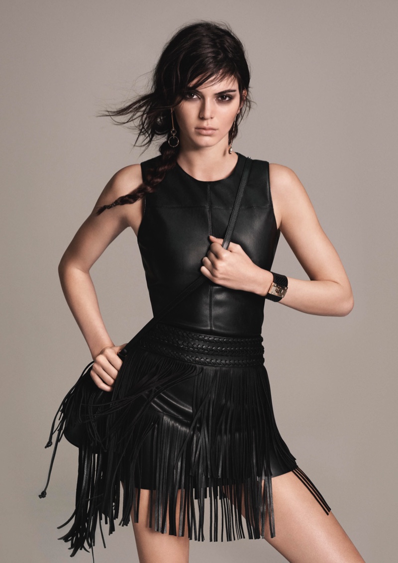 Kendall models a leather top and fringe miniskirt from Mango