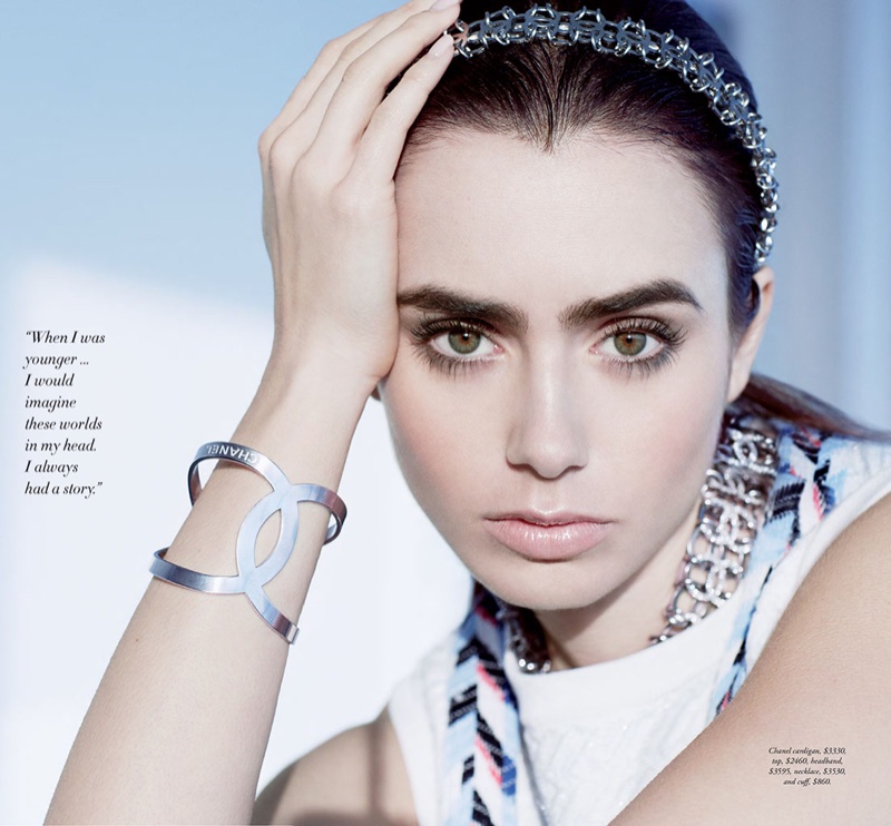 Lily Collins shows off a bracelet featuring the Chanel interlocking C logo