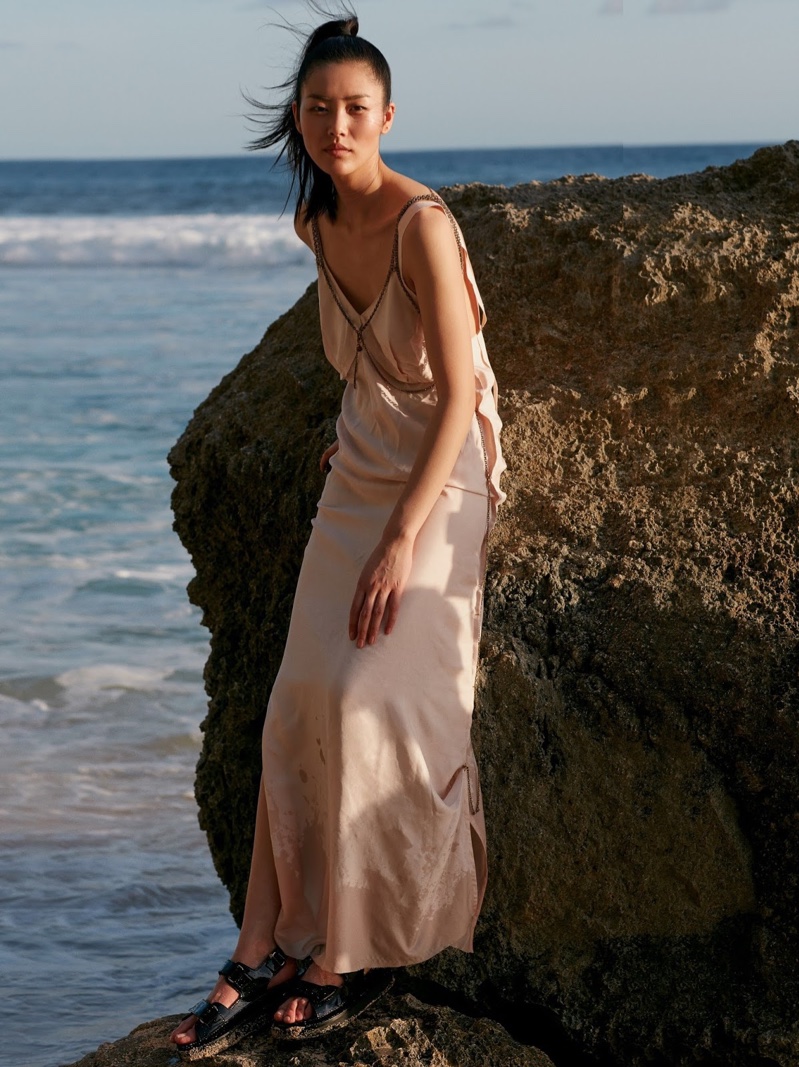 Liu Wen models a slip dress from white Calvin Klein Collection dress